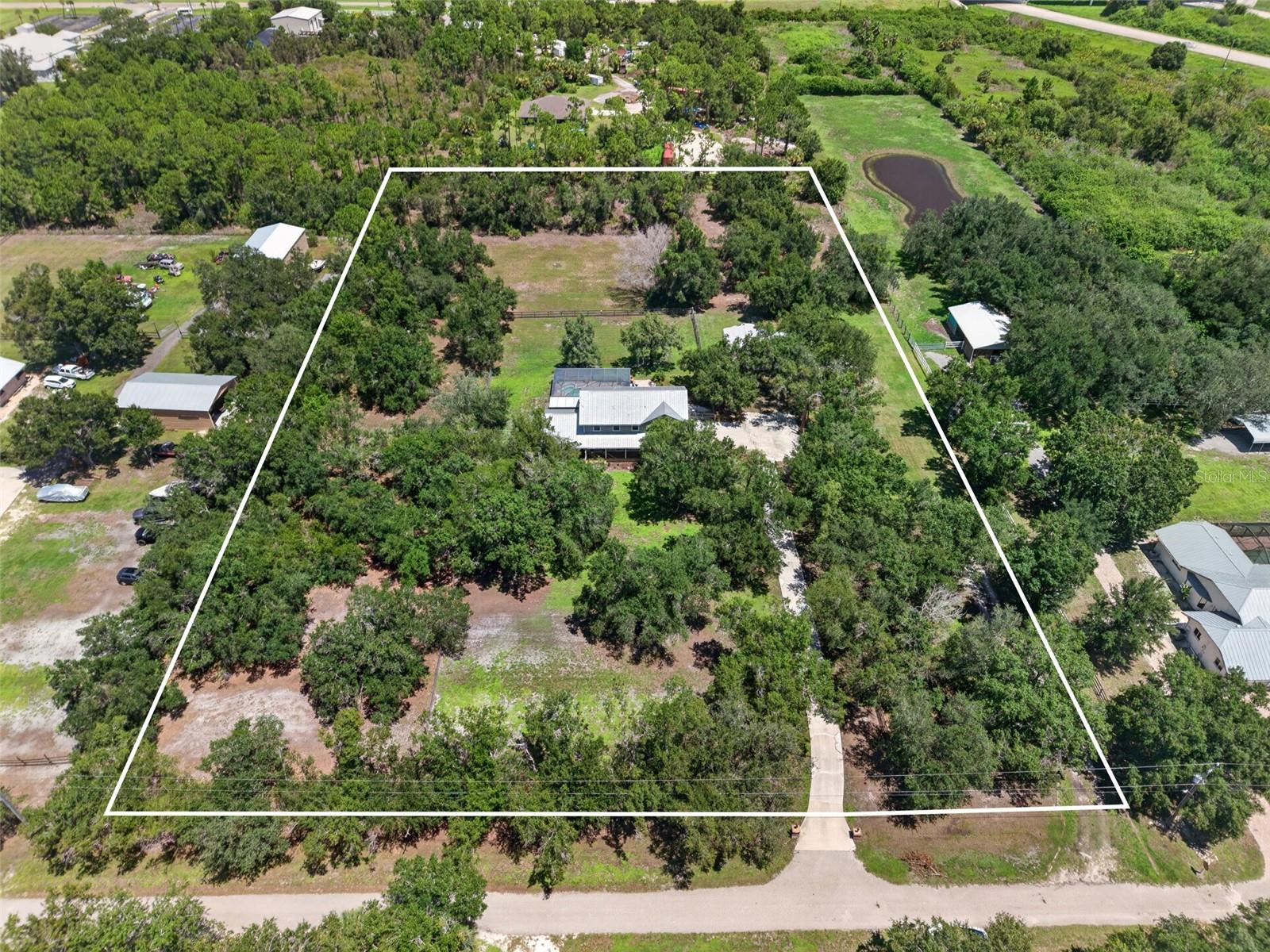 24582 Tangelo Ave, Port Charlotte, FL 33980 photo