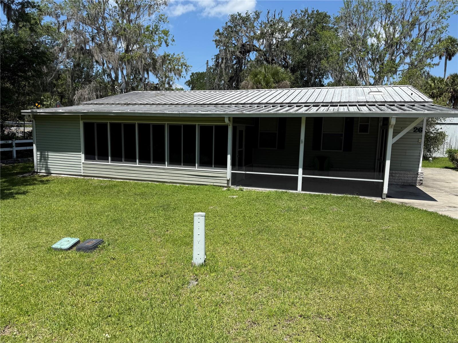 26 Canal Way, Lake Panasoffkee, FL 33538 photo