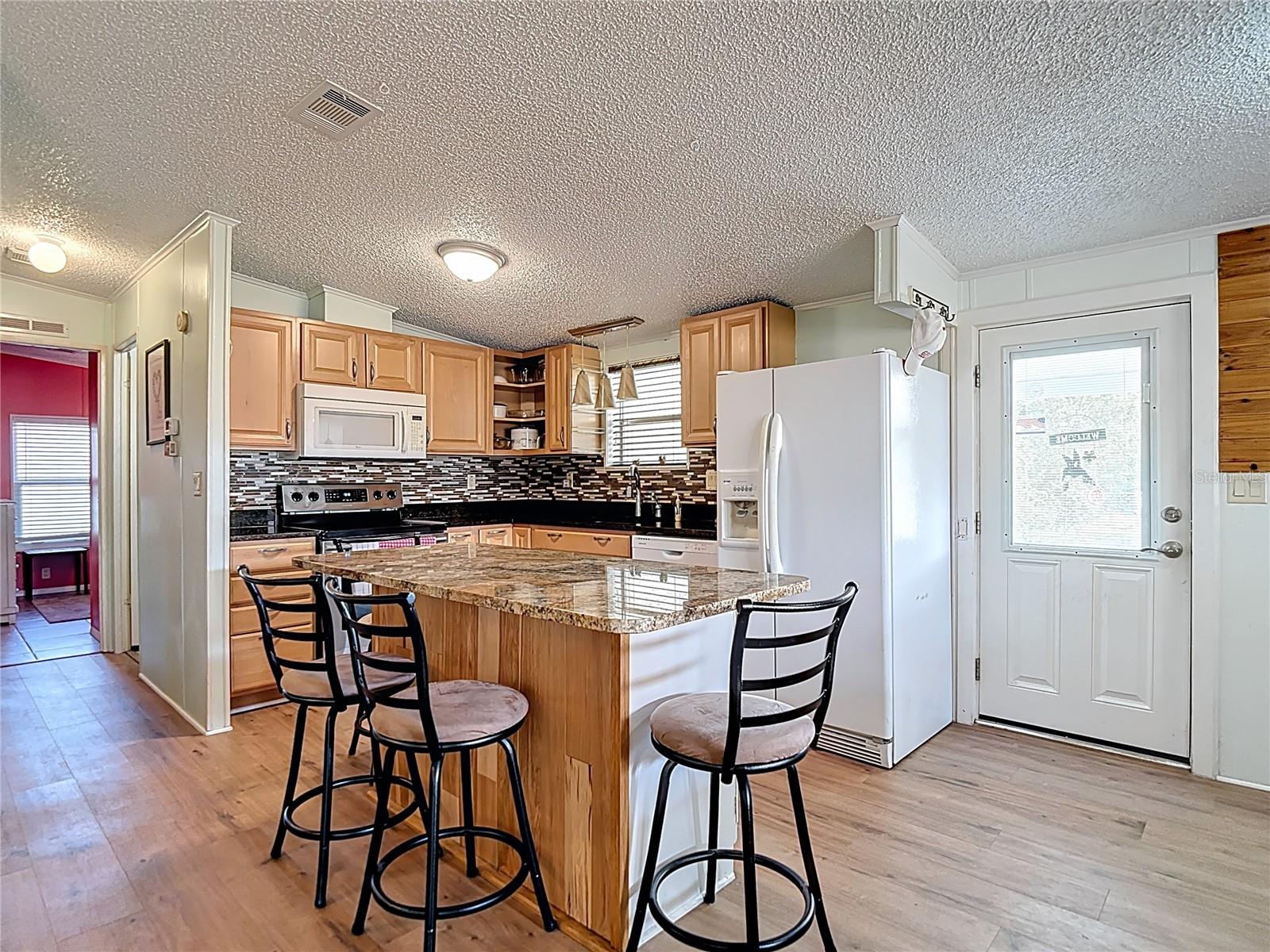 Manufactured Home in DADE CITY FL 10033 WELLINGTON AVENUE 13.jpg