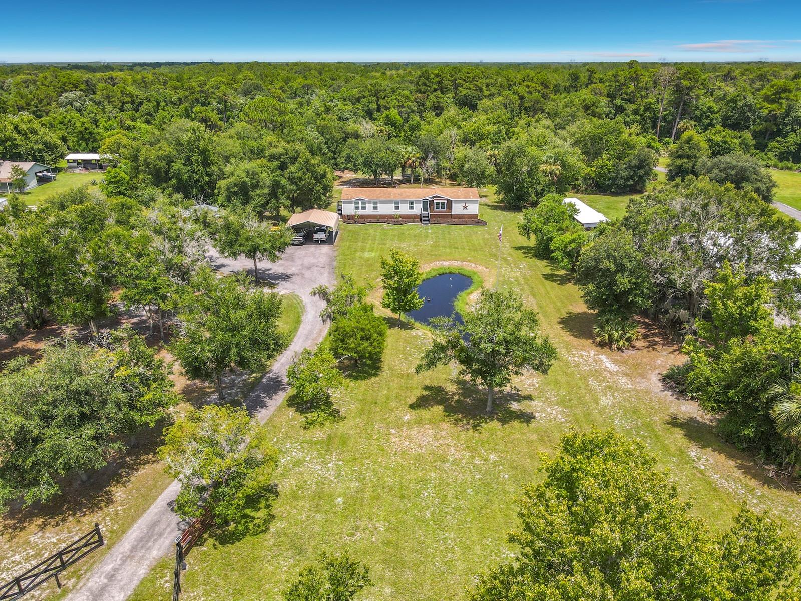 353 Uranus Trl, Osteen, FL 32764 photo