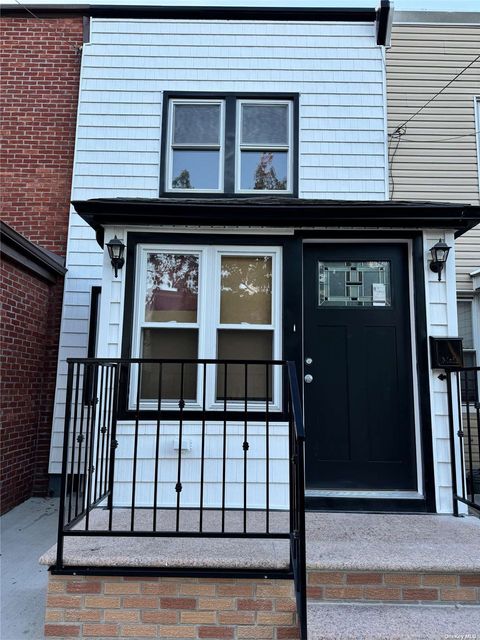 Single Family Residence in Jamaica NY 152-25 118th Avenue.jpg