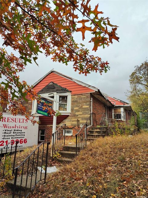 Single Family Residence in Kew Garden Hills NY 135-11 77th Avenue.jpg