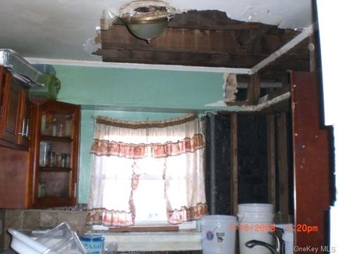 Single Family Residence in Jamaica NY 116-09 167 Street.jpg