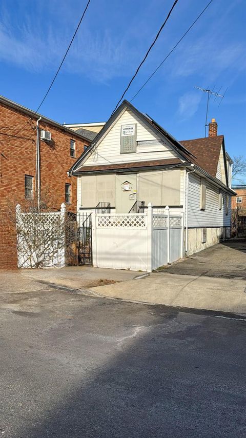 Single Family Residence in Jamaica NY 107-17 157th Street.jpg