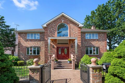 Single Family Residence in Bayside NY 64-16 211th Street.jpg