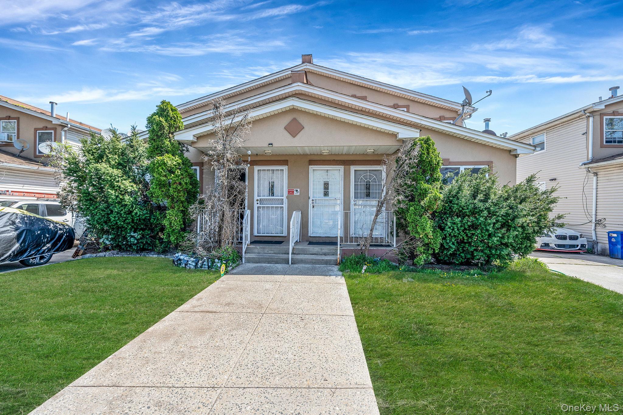 140 37 Charles Ln, Springfield Gardens, NY 11413