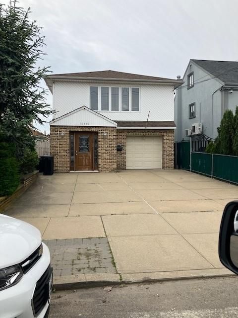 Single Family Residence in Howard Beach NY 16330 95th Street.jpg