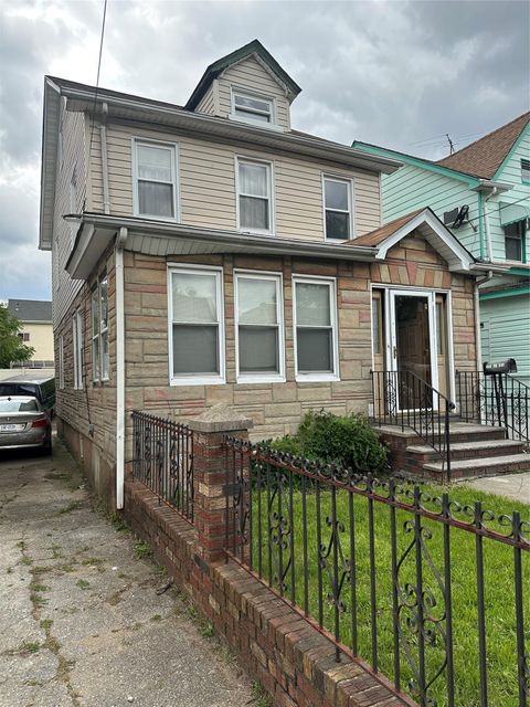 Single Family Residence in Jamaica NY 11628 167th Street.jpg