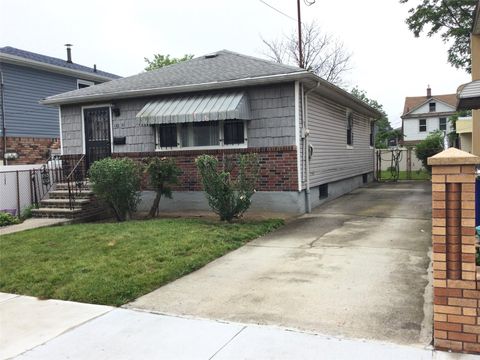 Single Family Residence in Jamaica NY 122-21 Long Street.jpg