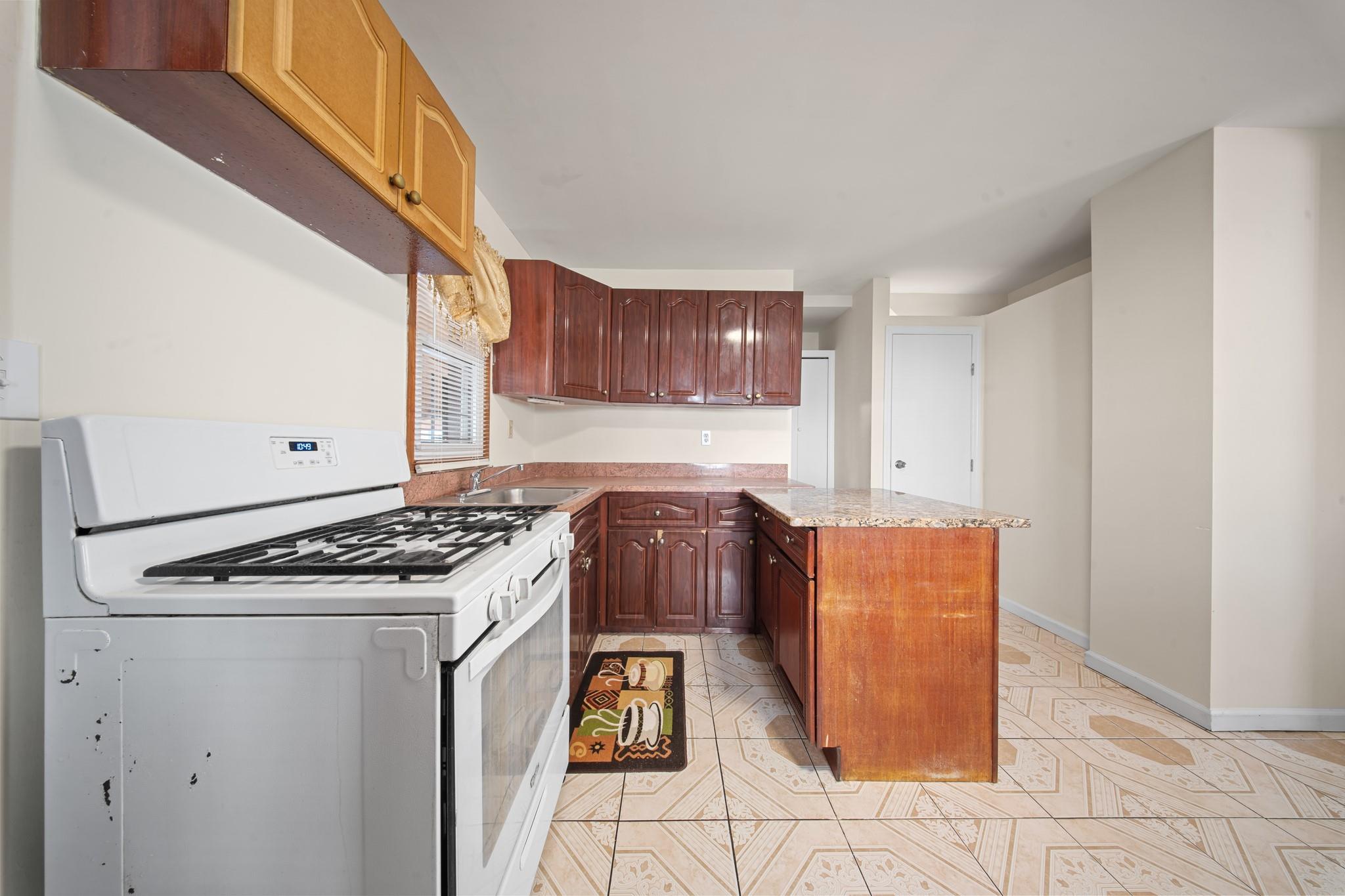 Single Family Residence in Springfield Gardens NY 13121 Mathewson Court 11.jpg
