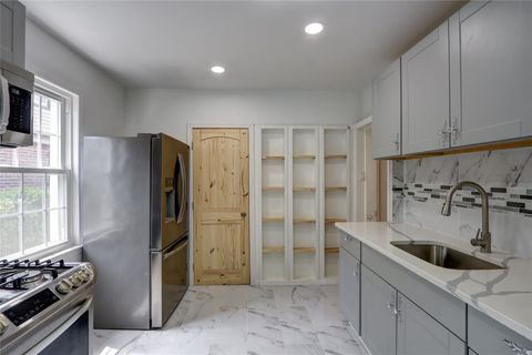 Single Family Residence in Laurelton NY 13055 222nd Street.jpg