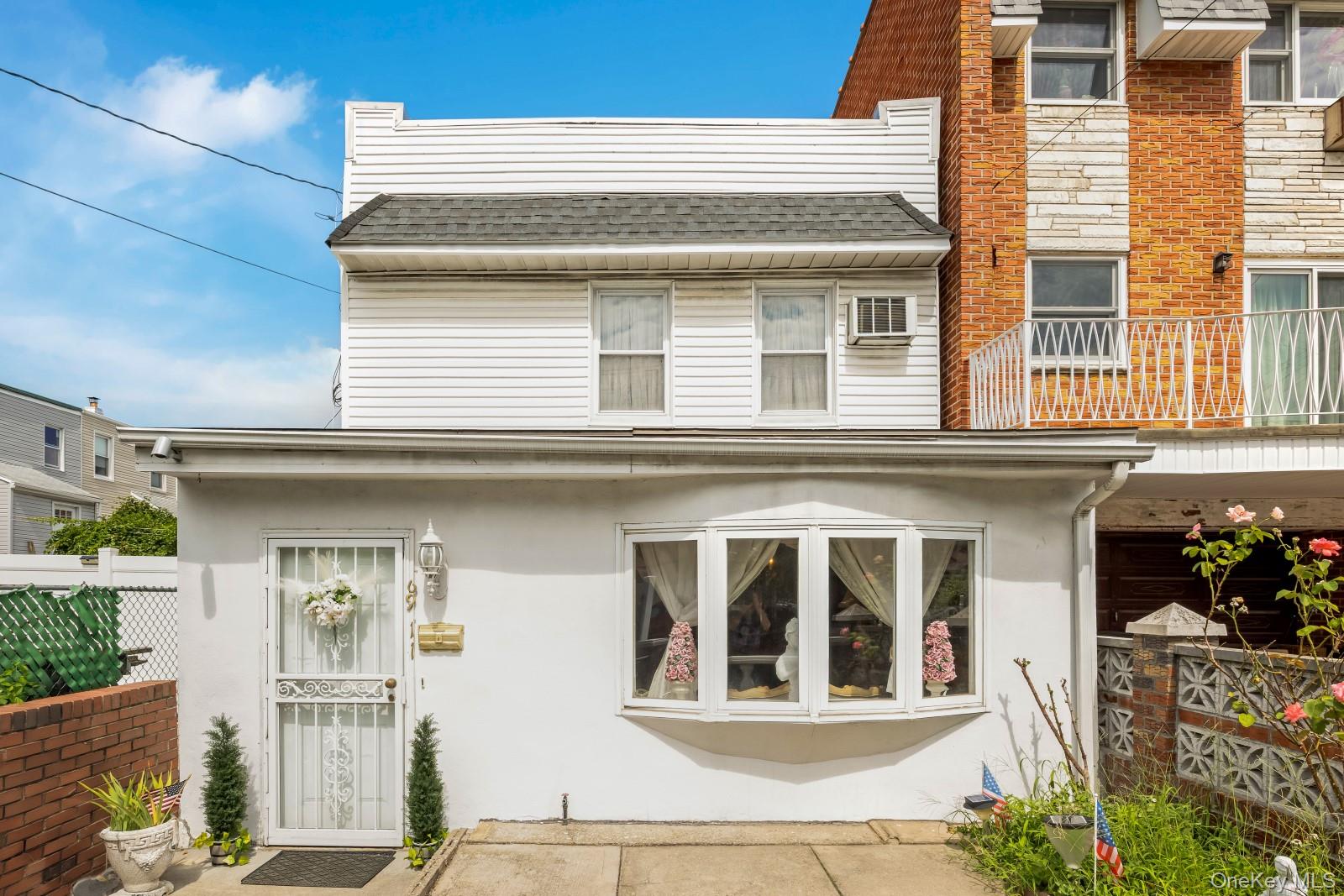 69 11 62nd Dr, Middle Village, NY 11379