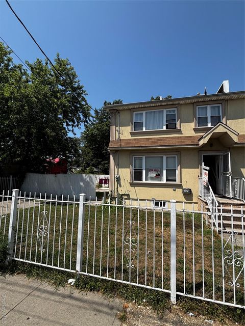 Single Family Residence in Springfield Gardens NY 143-08 224 Street.jpg