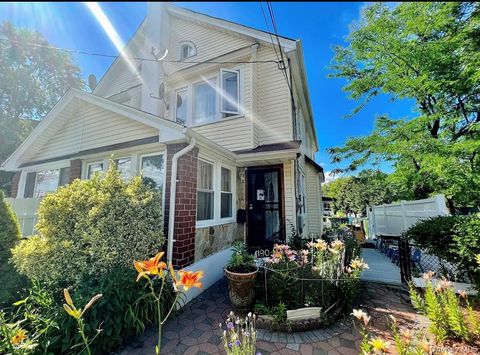 Single Family Residence in Saint Albans NY 19027 109th Road.jpg
