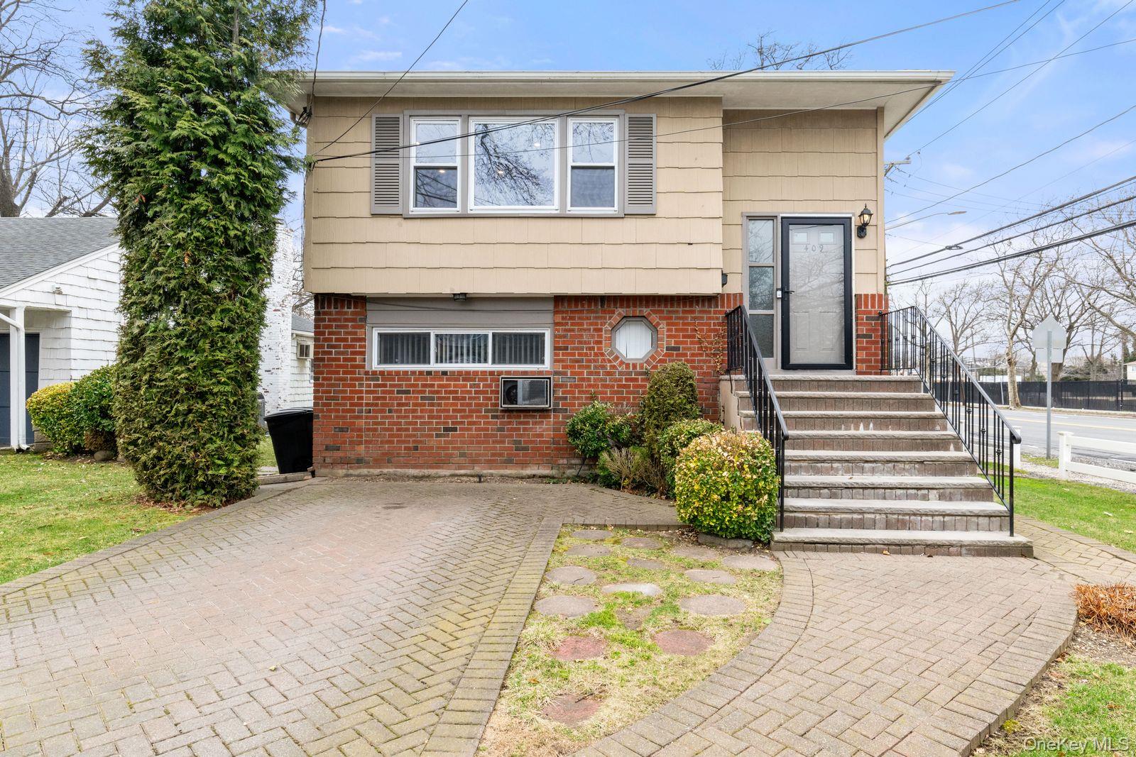 409 Barnard Ave, Woodmere, NY 11559