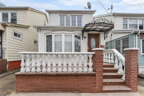 Single Family Residence in Kew Garden Hills NY 7914 153rd Street.jpg