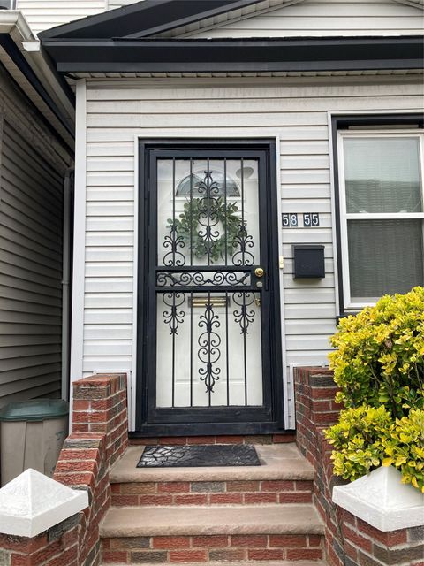 Single Family Residence in Woodside NY 5855 41st Drive 1.jpg