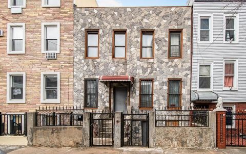 Single Family Residence in Bronx NY 443 E 143rd Street.jpg