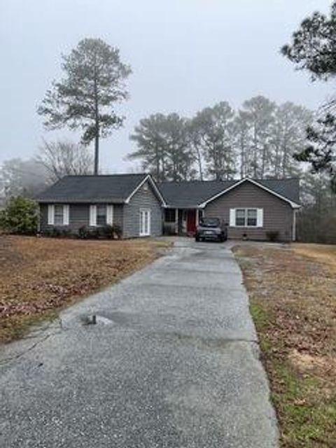 Single Family Residence in Snellville GA 1988 Fabersham Drive.jpg